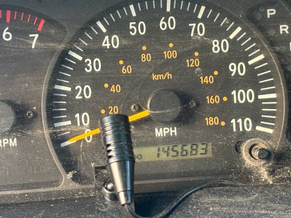 2000 Toyota Tundra SR5 V8 2dr 4x4 Regular Cab 8 ft. box Automatic — photo 4