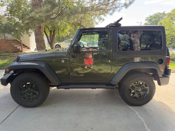 2015 Jeep Wrangler Sport 2dr 4x4 Manual — photo 1