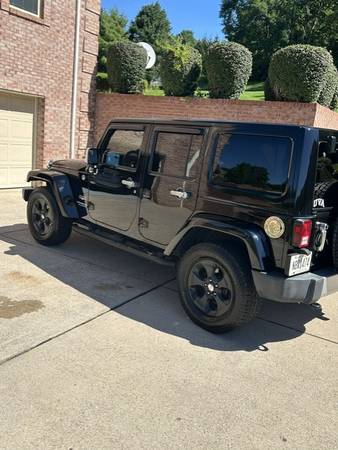2015 Jeep Wrangler Sahara — photo 2