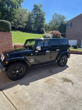 2015 Jeep Wrangler Sahara — photo 1