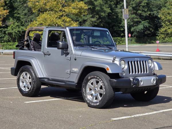 2014 Jeep Wrangler Sahara — photo 1