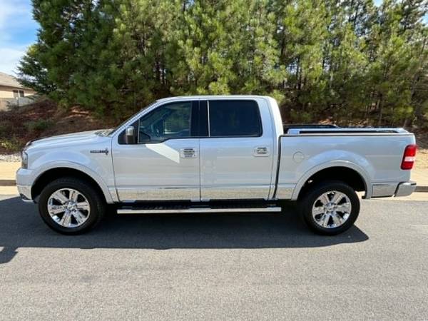2006 Ford F 150 XL 4x2 Regular Cab Styleside 8 ft. box 145 in. WB Manual — photo 2
