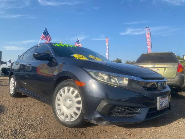 2017 Honda Civic LX 4dr Hatchback CVT — photo 1