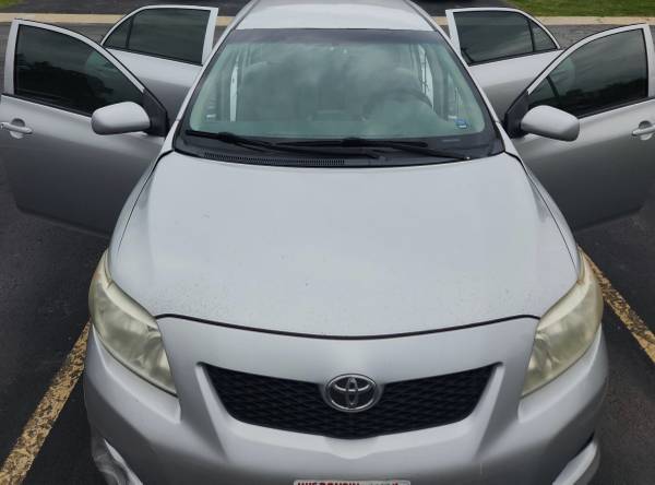 2009 Toyota Corolla LE 4dr Sedan Automatic — photo 1