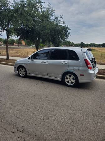 2003 Suzuki Aerio SX Base 4dr Front-wheel Drive Hatchback Manual — photo 2