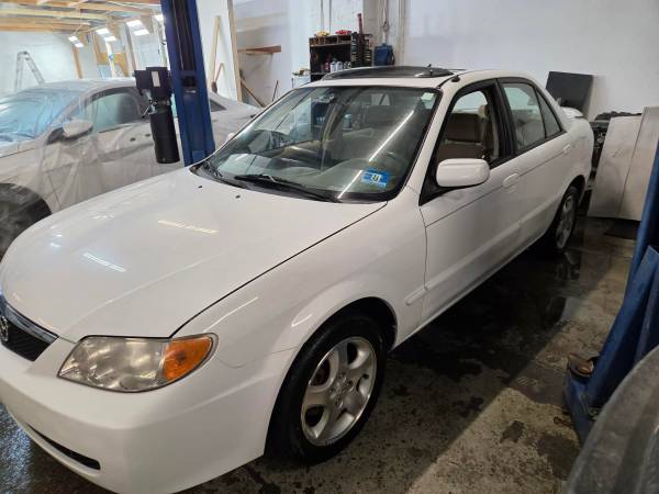 2002 Mazda Protege DX — photo 2
