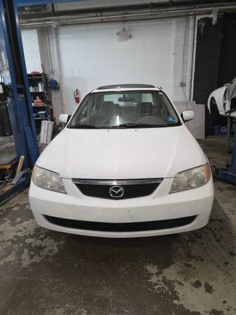 2002 Mazda Protege DX — photo 1