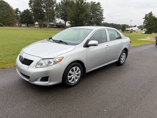 2010 Toyota Corolla LE 4dr Sedan Automatic — photo 1