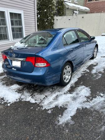 2009 Honda Civic LX 4dr Sedan Manual — photo 1