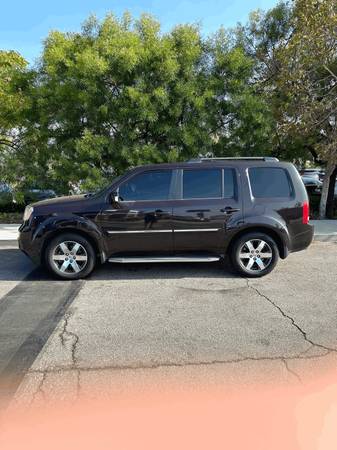 2012 Honda Pilot Touring 4dr 4x4 Automatic — photo 2