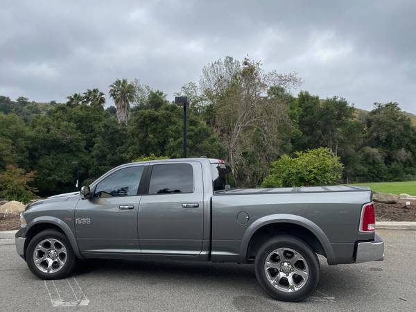 2013 RAM 1500 Laramie 4x4 Quad Cab 140 in. WB Automatic — photo 1