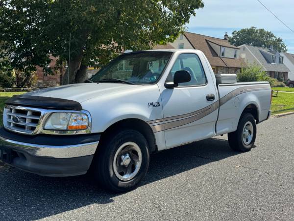 1999 Ford F 150 XL 4x4 Super Cab Styleside 157.4 in. WB Manual — photo 1