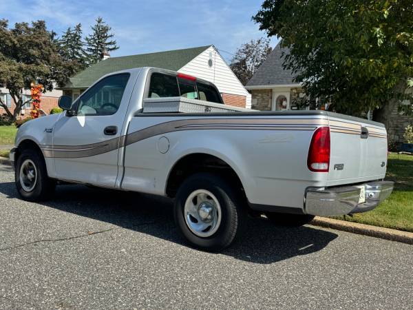 1999 Ford F 150 XL 4x4 Super Cab Styleside 157.4 in. WB Manual — photo 4