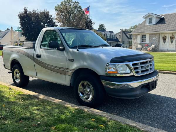 1999 Ford F 150 XL 4x4 Super Cab Styleside 157.4 in. WB Manual — photo 2