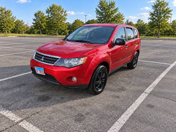 2009 Mitsubishi Outlander SE 4dr 4x4 CVT — photo 1
