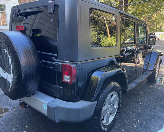 2010 Jeep Wrangler Sahara — photo 3