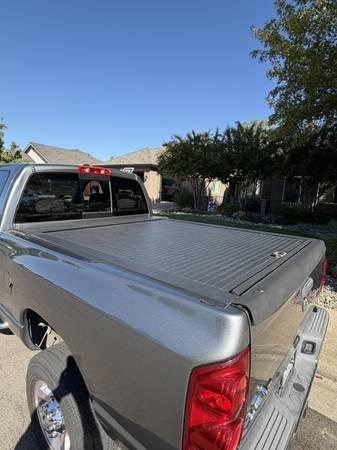 2009 Dodge RAM 2500 Laramie 4x2 Quad Cab 140.5 in. WB Automatic — photo 1