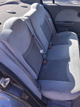 2004 Saturn ION 3 4dr Coupe CVT — photo 9
